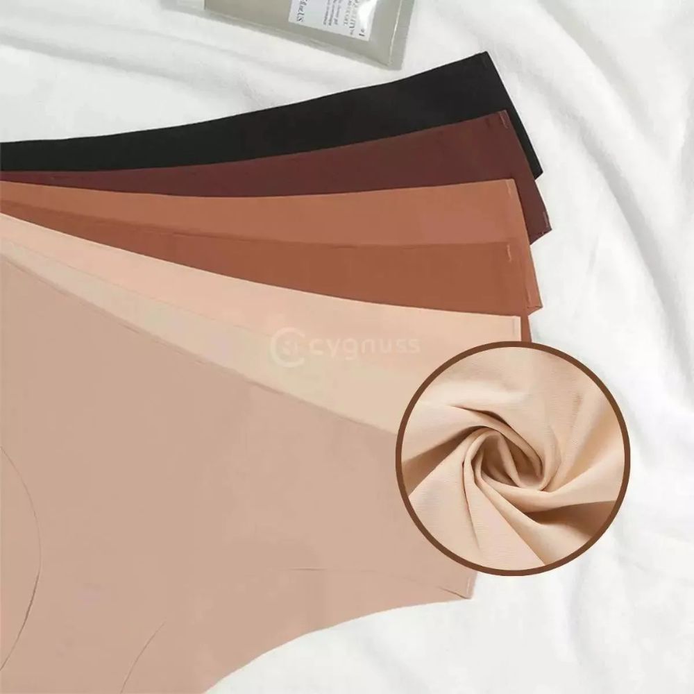 Imagem de calzones sin costuras da Cygnuss dispostas em leque, exibindo uma variedade de tons neutros, do beige claro ao marrón escuro. Um detalhe em close destaca a maciez y elasticidade do tejidos.