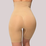Vista traseira do Short Shape moldeador da Cygnuss na color beige, con cintura alta y compresión estratégica, realçando o bumbum con efeito lifting y acabamento anatômico nas coxas.