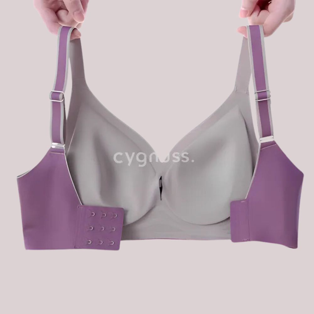 sostén Cygnuss con tirantes ajustáveis y cierre removible, mostrando a versatilidade do produto, em color gris y roxo.